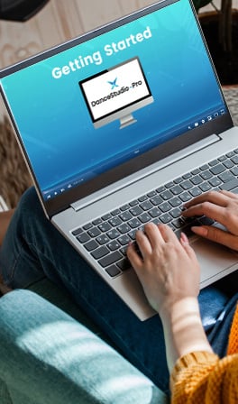 Someone accessing a Studio Pro demo on a laptop