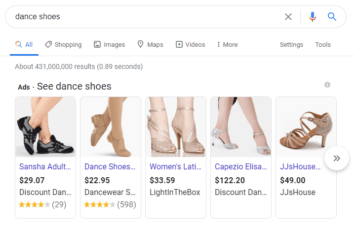 An example search engine results page showing pay-per-click ads for products.