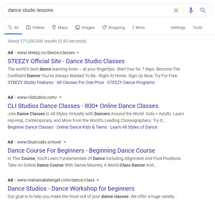 An example search engine results page showing pay-per-click ads “for dance studio lessons.”